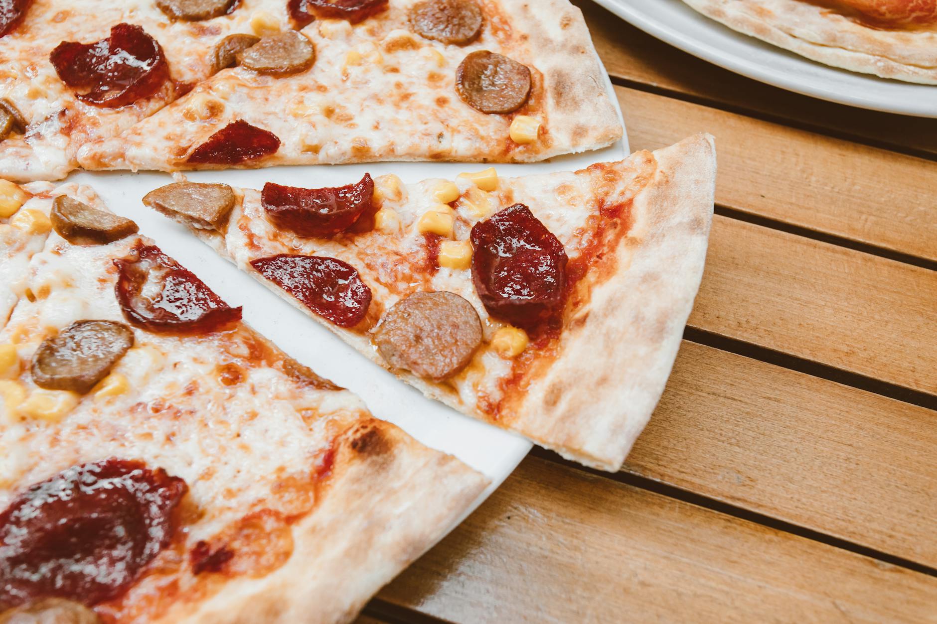 Meat lovers pizza loaded with pepperoni, sausage and ham toppings
